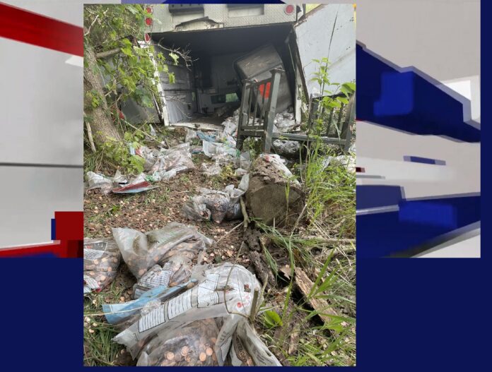 BRINKS ARMORED TRUCK OVER TURNS ON INTERSTATE 485