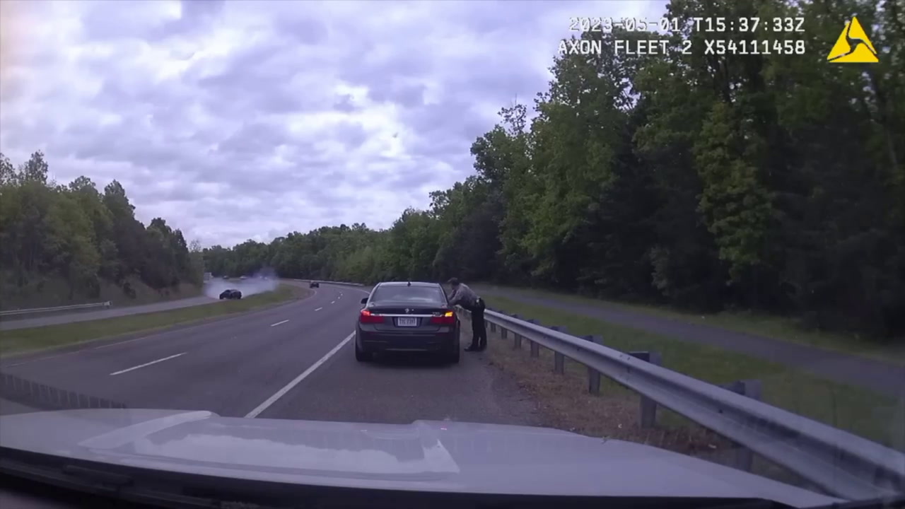 VIDEO: COP ALMOST GETS SQUISHED IN TRAFFIC ACCIDENT