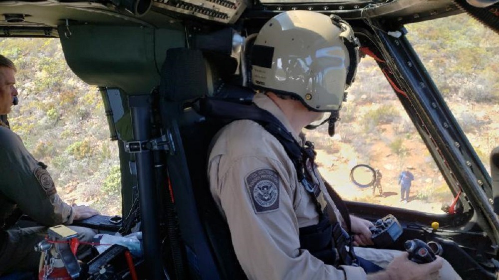 TWO ILLEGAL IMMIGRANTS RESCUED BY HELICOPTER IN MIDDLE OF DESERT