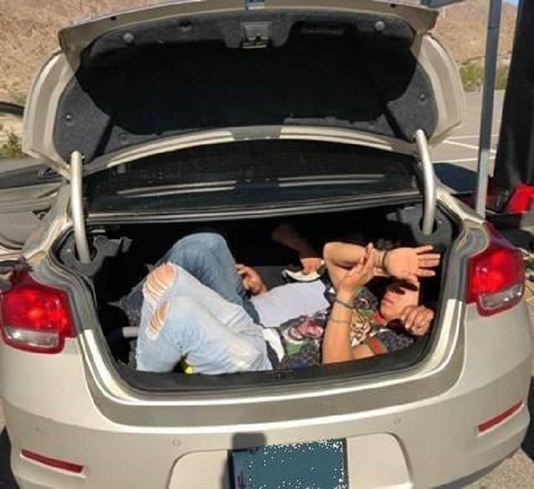 ILLEGAL IMMIGRANTS FOUND HIDING IN TRUNK OF CAR
