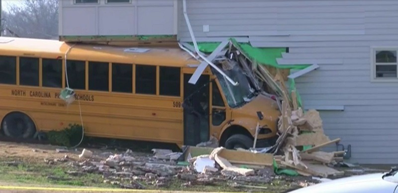 SCHOOL BUS RUNS INTO BUILDING WHILE STUDENTS ABOARD, INJURIES INVOLVED