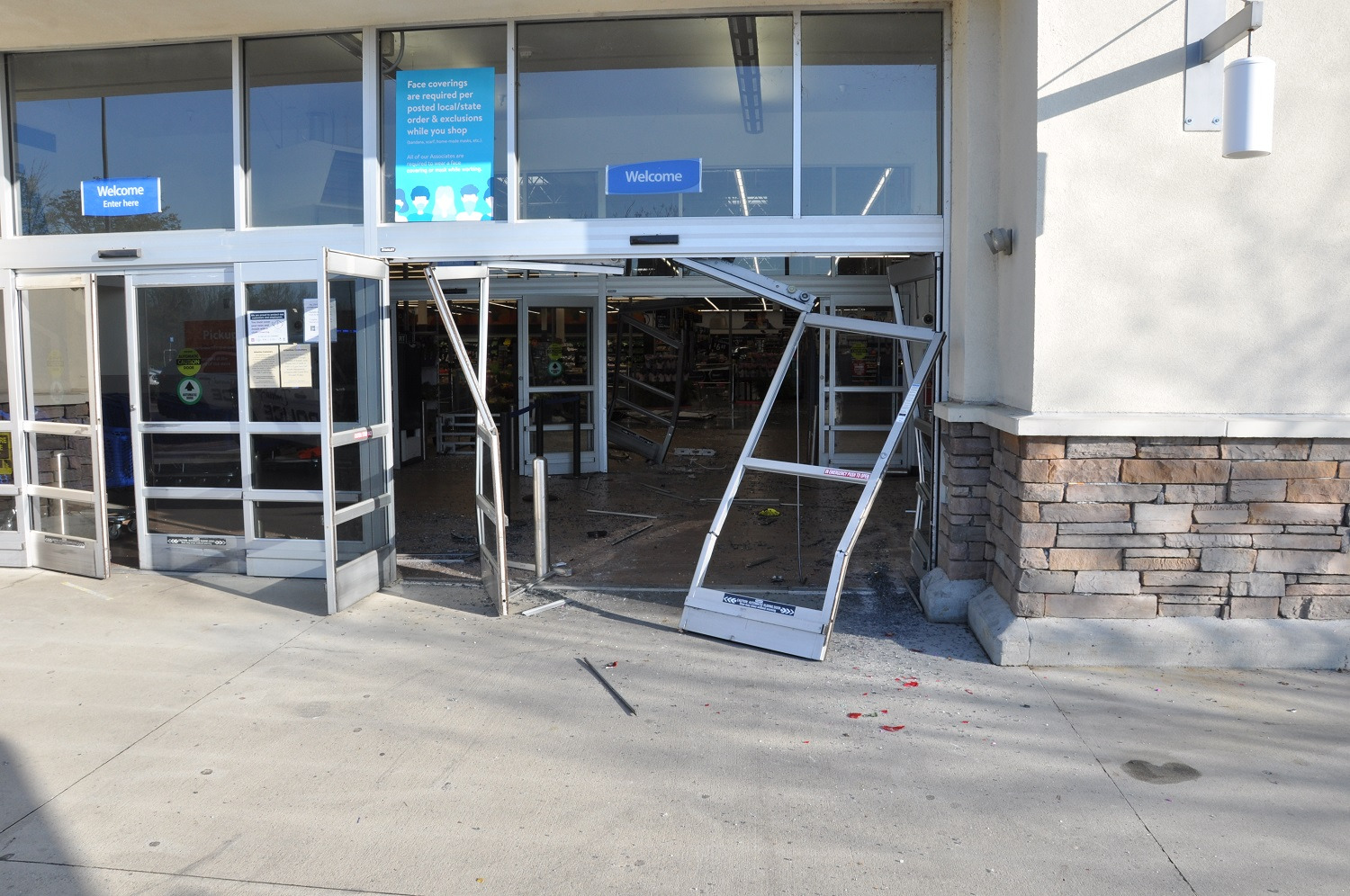 FIRED WALMART EMPLOYEE PLOWS THROUGH WALMART WITH CAR ON GOOD FRIDAY