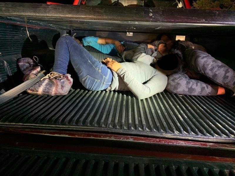 ILLEGAL IMMIGRANTS CROSS INTO UNITED STATES AND HIDE IN BED OF A SPEEDING TRUCK