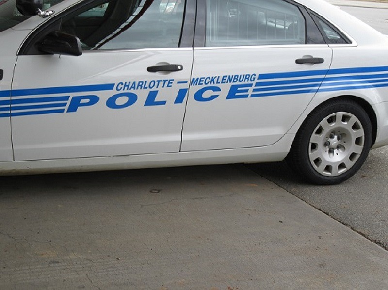 DEAD BODY FOUND IN WEST CHARLOTTE BEHIND STRIP MALL