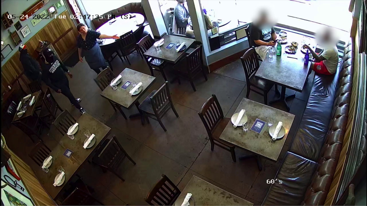 VIDEO: CUSTOMERS GET ROBBED INSIDE RESTAURANT WHILE EATING