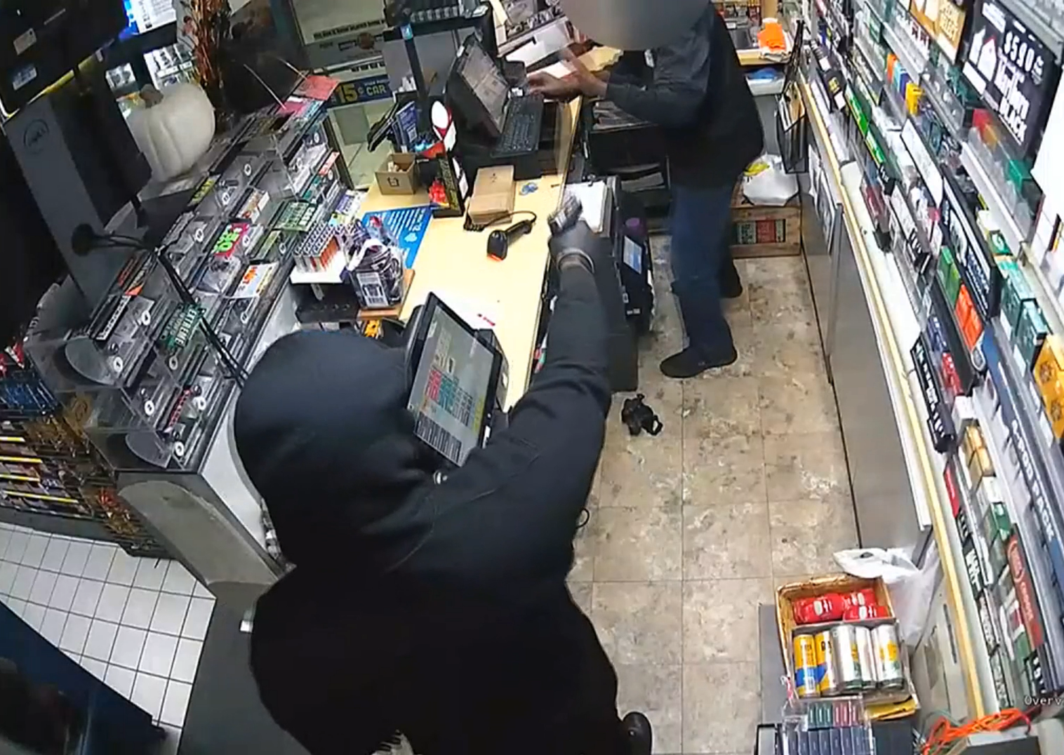 VIDEO: ARMED GAS STATION ROBBERY, SUSPECT EMPTIES REGISTER