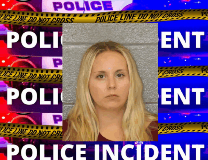 WOMAN CHARGED WITH DWI, ACCUSED OF NEARLY HITTING COP CAR