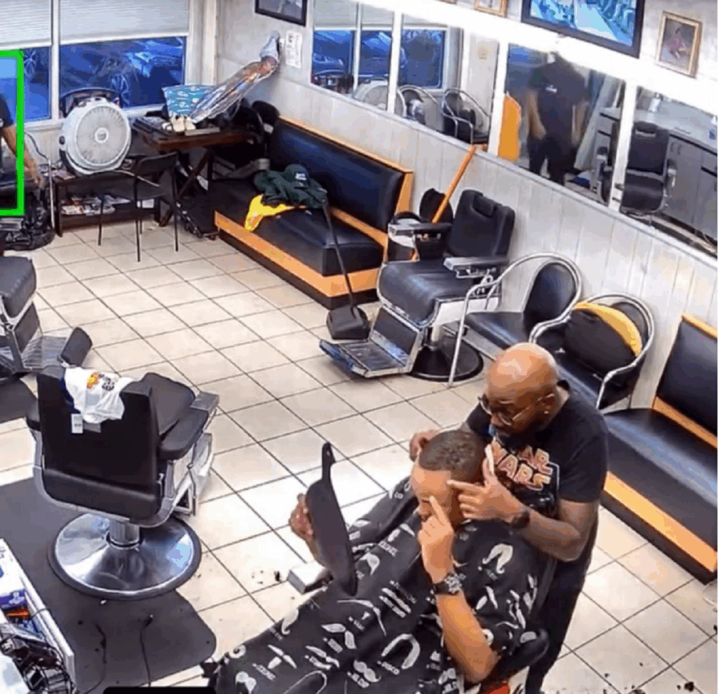 VIDEO BARBER SHOP CUSTOMER PULLS GUN ON BARBER