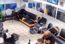 VIDEO BARBER SHOP CUSTOMER PULLS GUN ON BARBER