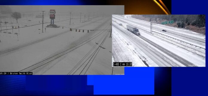 CHARLOTTE GETTING 10 INCHES OF SNOW, SNOW FALLS IN CHARLOTTE, CLOGS ROADS AND HIGHWAYS, BUS SERVICE CANCELLED