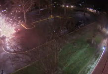 VIDEO COP SHOT ON DUTY SITTING IN POLICE CAR AT POLICE STATION