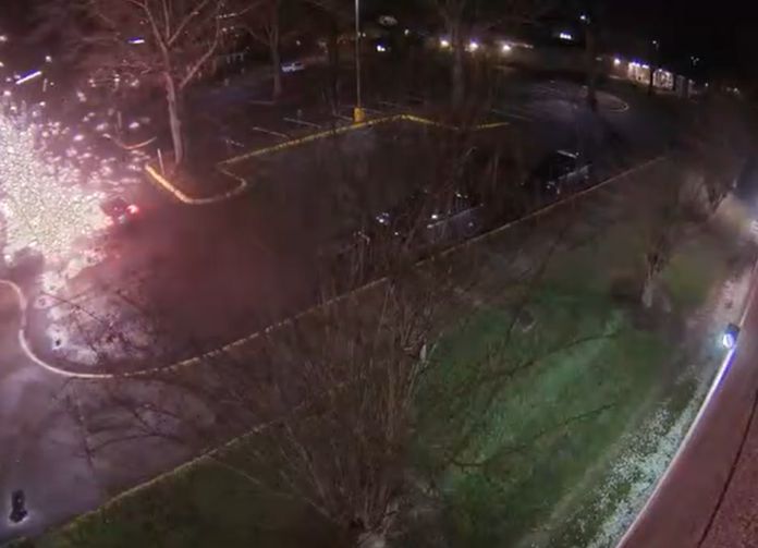 VIDEO: COP GETS SHOT ON DUTY WHILE SITTING IN POLICE CAR AT POLICE STATION, SUSPECT UNLOADED ON COP