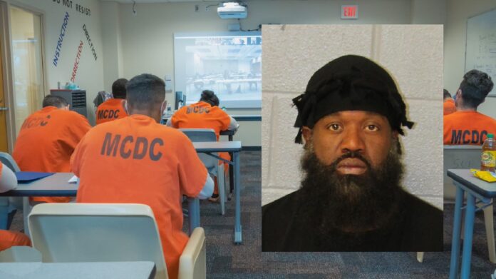 MAN TAKES JAIL PHOTO WITH DEW RAG SIMILAR COVERING ON