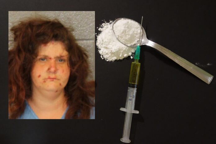 WOMAN ACCUSED OF DRUG POSSESSION WITH SCARS ON FACE, HAD FENTANYL IN BRA