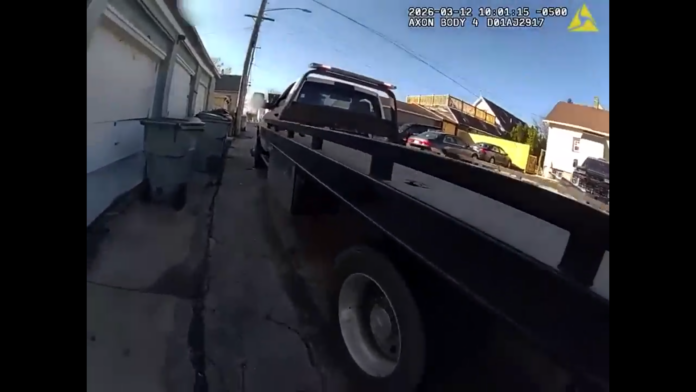 VIDEO: TOW TRUCK DRIVER DRIVES OFF WITH POLICE HANGING ON WINDOW, COP SHOOTS AND KILLS TOW TRUCK DRIVER
