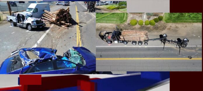 LOG TRUCK FLIPS OVER, SPILLS LOGS ONTO ROAD NEAR CHARLOTTE