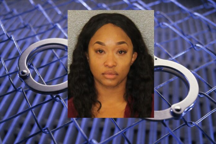 WOMAN ARRESTED ON DWI CHARGE ACCUSED OF SWERVING ON INDEPENDENCE BLVD