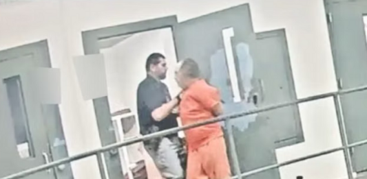VIDEO JAIL GUARD ARRESTED inmate fight